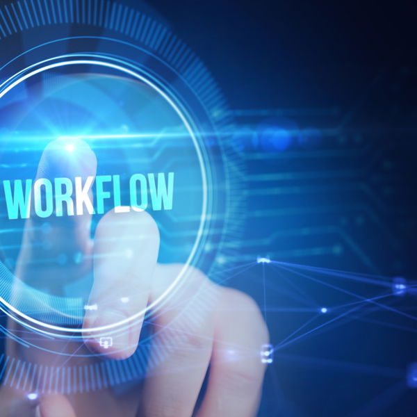 Hand pointing to holgraphic workflow symbol