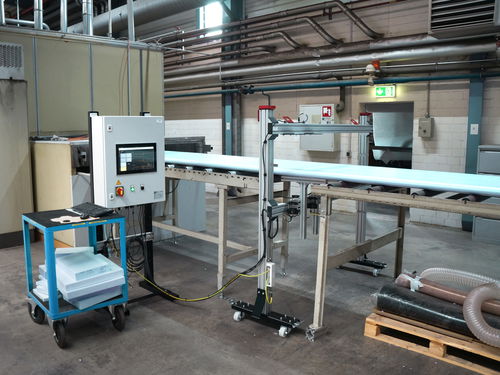 FOAMCONTROL measuring frame, positioned above the conveyor system