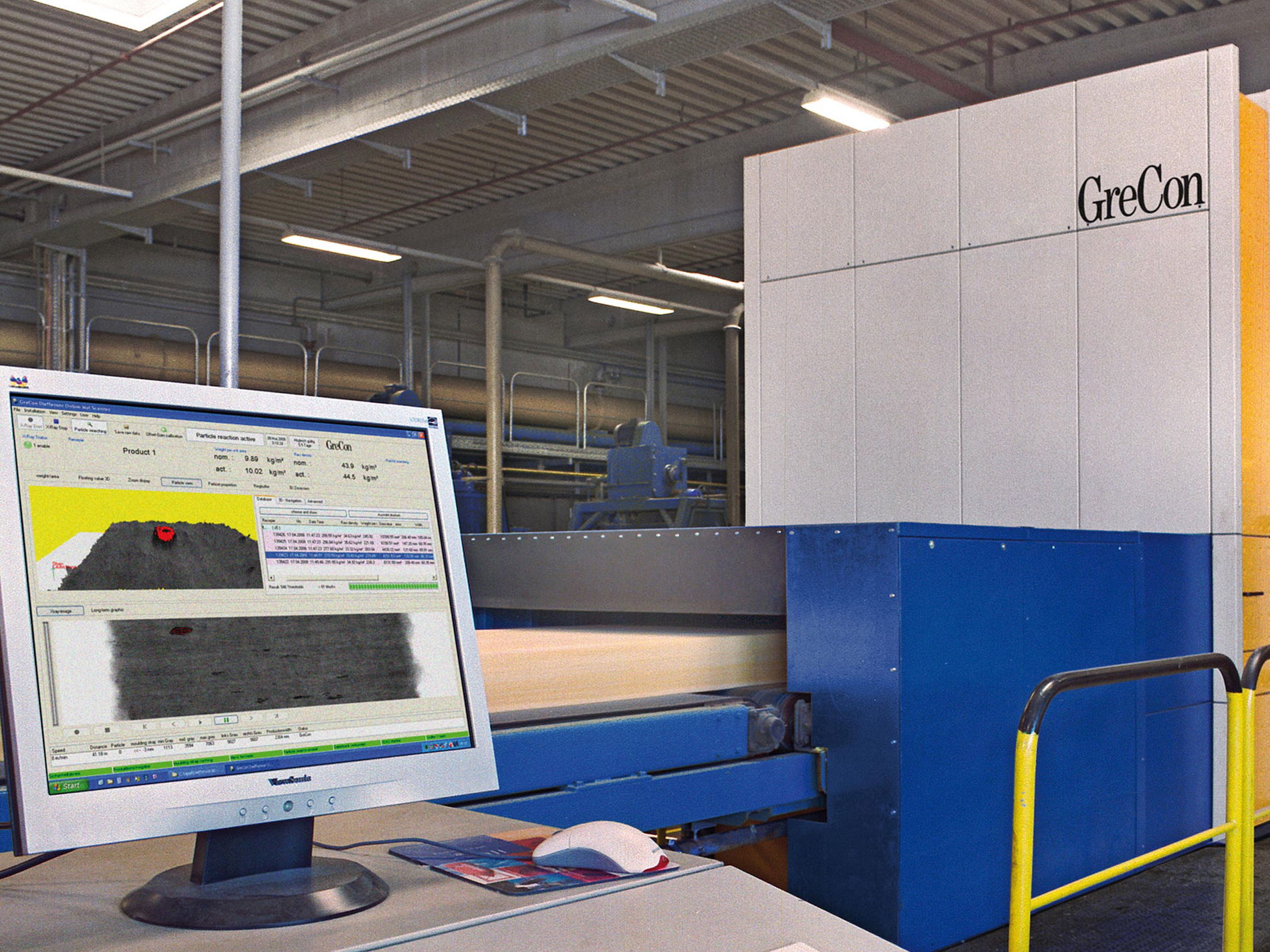 GreCon MATCONTROL installed in a production line, including monitor for the software