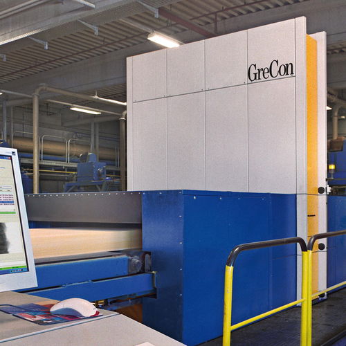 GreCon MATCONTROL installed in a production line, including monitor for the software