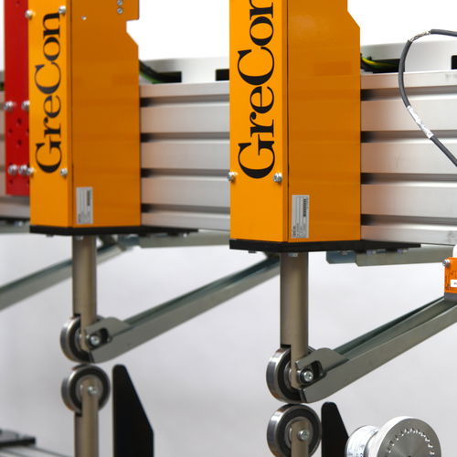 GreCon THICKNESSCONTROL RT as contact rollers on a conveyor belt